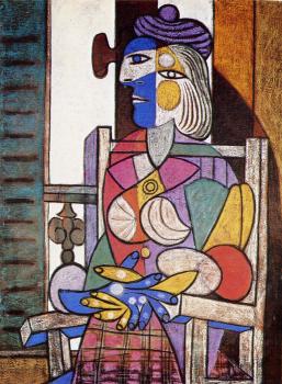 woman seated before the window